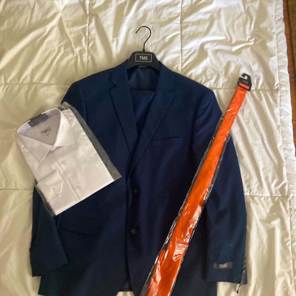 3 Piece suit with shirt and tie. Brand new, never been worn!